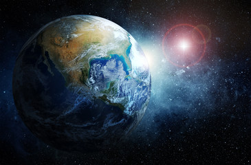 Earth and galaxy. Elements of this image furnished by NASA.