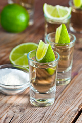 gold tequila with salt and lime