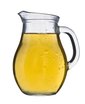 A jug filled with white wine isolated on a white background