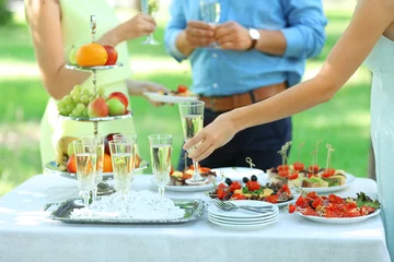 Möbelaufkleber Guests drink champagne on wedding ceremony © Africa Studio