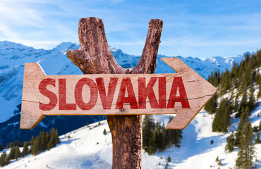 Slovakia wooden sign with winter background