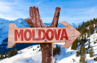 Moldova wooden sign with winter background