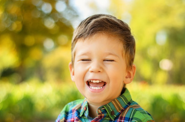 Portrait of laughing little boy