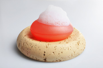 Soap with foam isolated on white