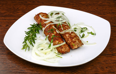 Kebab with onion rings