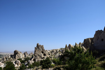Fototapeta na wymiar Fairy chimneys in Goreme National Park, Cappadocia, Turkey