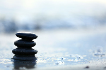 Spa stones on sea beach outdoors