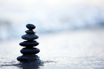 Spa stones on sea beach outdoors