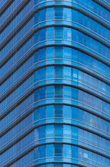 Blue glass office building window background