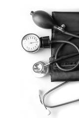 Blood pressure meter and stethoscope, on white background