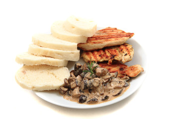 chicken meat with mushrooms and dumplings