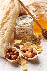 Healthy breakfast with bread, honey, nuts. Country breakfast concept