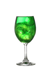 Green water in a wine glass isolated on white.