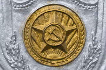 Painted Soviet emblem star on a building in Moscow