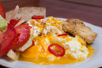 delicious and nourishing dinner. Vegetable salad, fish and eggs