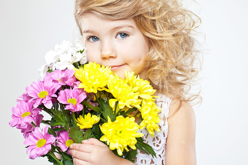 little girl with bouquet of flowers 