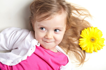 Little girl with flower 