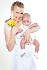 Happy mother with her newborn son 