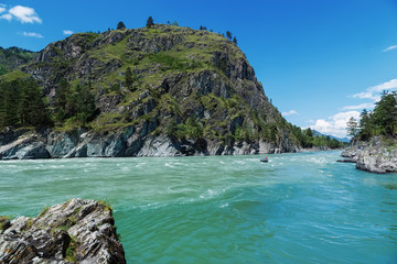 Fototapeta na wymiar river flows into another river Altai mountains sunny summer