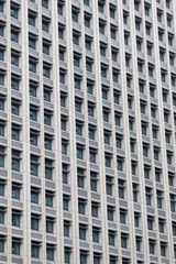 Fototapeta premium Windows of Modern Business Office Building in downtown.