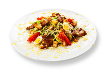 Fresh appetizer - meat salad with tomatoes and eggs