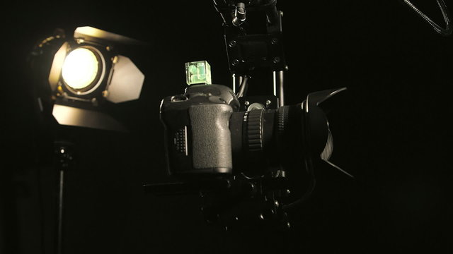 Hot head camera on jib crane in action closeup pan right left