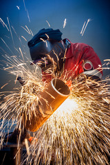  Welder works sparkle