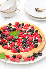 Cheesecake with summer berries and mint