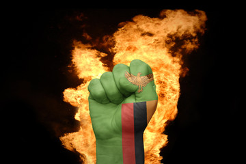 fire fist with the national flag of zambia