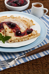 Blintzes or Pancakes with Blueberries. Selective focus.