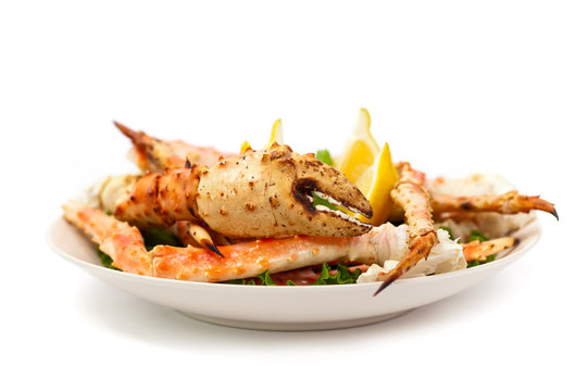 Crab Legs on white background. Selective focus.