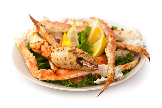 Crab Legs on white background. Selective focus.