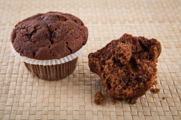 Chocolate chip muffin on wood table