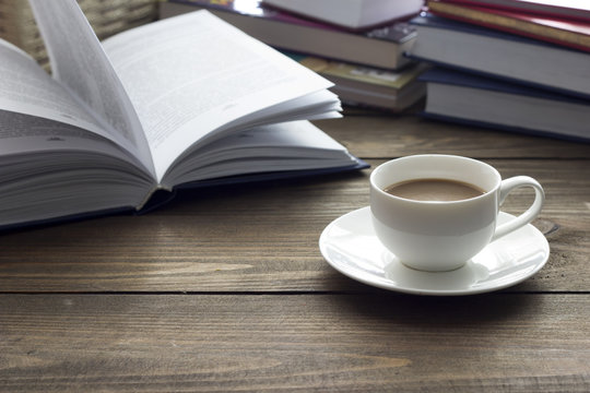 cup of coffee and a lot of books