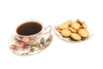 cup of tea and cookies on white