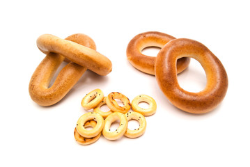 different tasty bagels on white