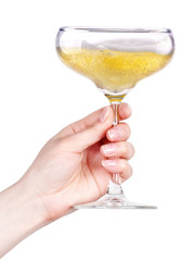 Hand with glass of champagne isolated on a white 