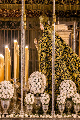 Float dedicated to Virgin Mary of the Presentation. Procession to Early Hours with the brotherhood of the Calvary. The float of the Virgin Mary is in the Cathedral of Seville.