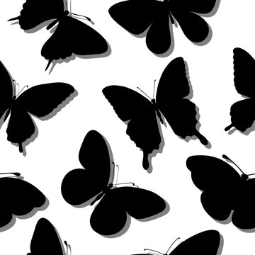 Beautiful seamless background with butterflies silhouettes.