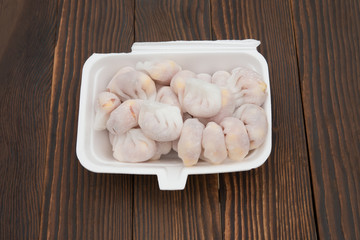 top view homemade dumpling filled with meat and corn on wooden board
