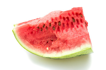 a piece of watermelon on a white background