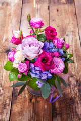 flowers. bouquet of roses on a wooden background