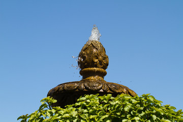 Old fountain still splashes at Mission San Juan Capistrano in California