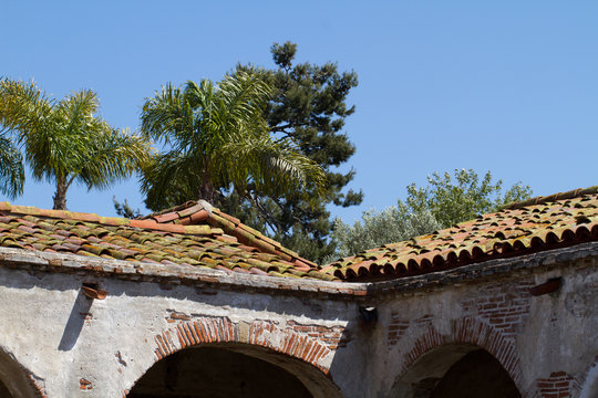 Historic building with tile rooftop in Mission San Juan Capistrano in California