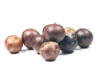 Flacourtia fruit over white background
