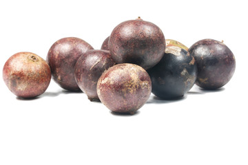 Flacourtia fruit over white background
