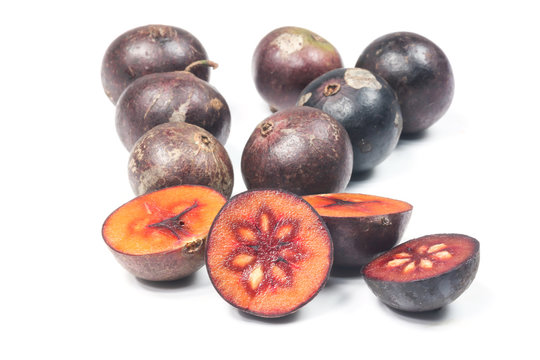 Flacourtia fruit over white background
