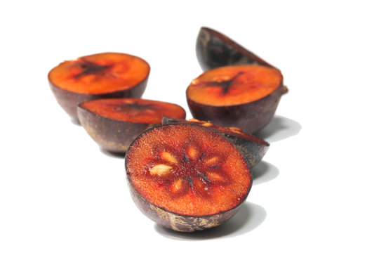 Flacourtia fruit on white background
