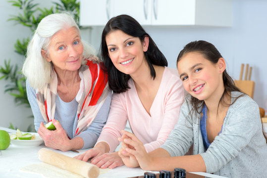 Three Generations Of Women Baking Together