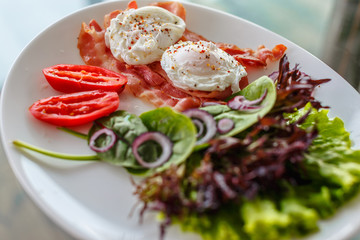 Vegetarian salad on white plate.